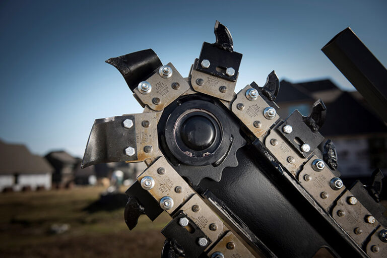 Trencher chain working_blue sky background